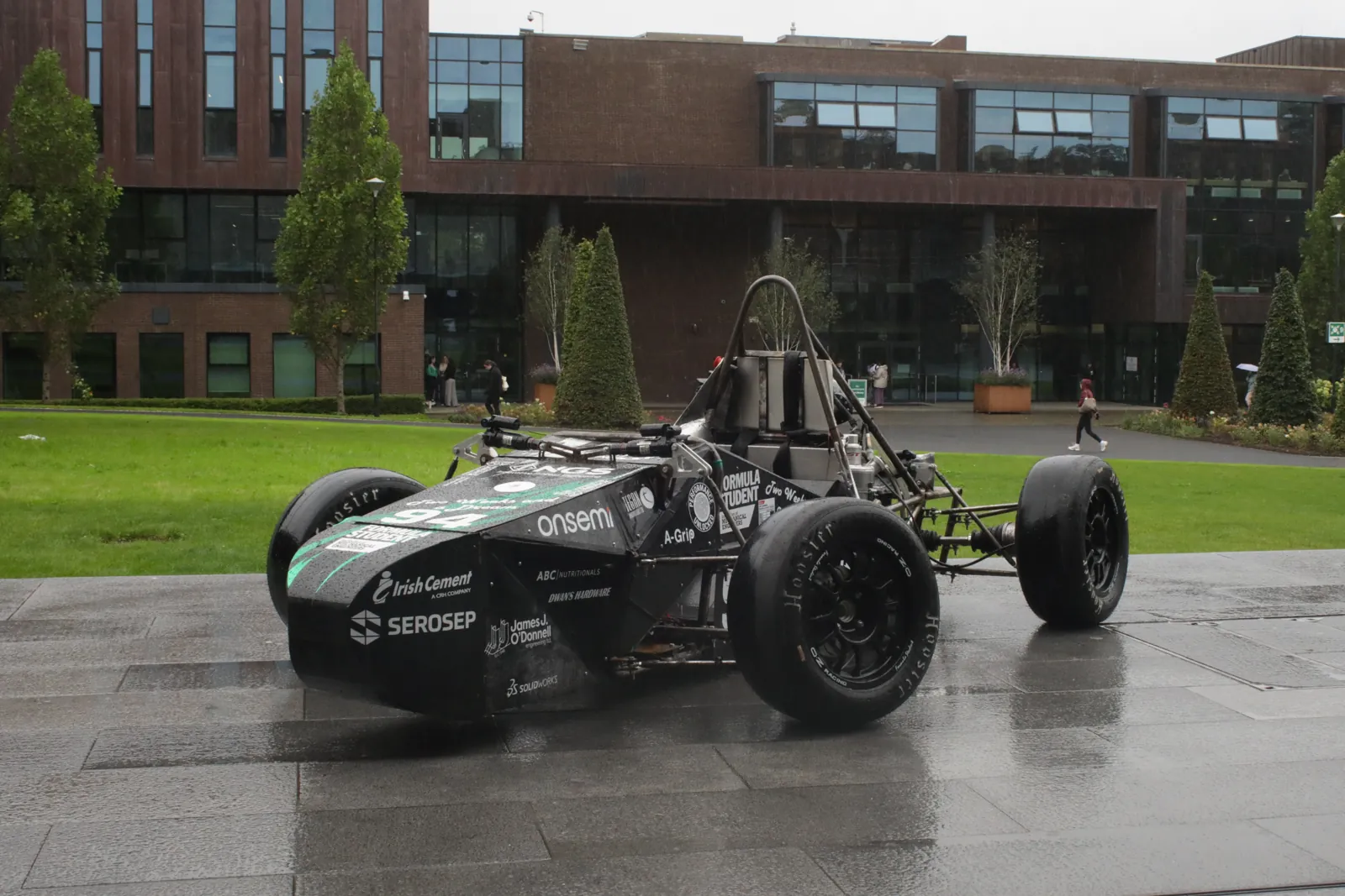Formula Student UL’s 2025/26 car parked outside on the University of Limerick campus.