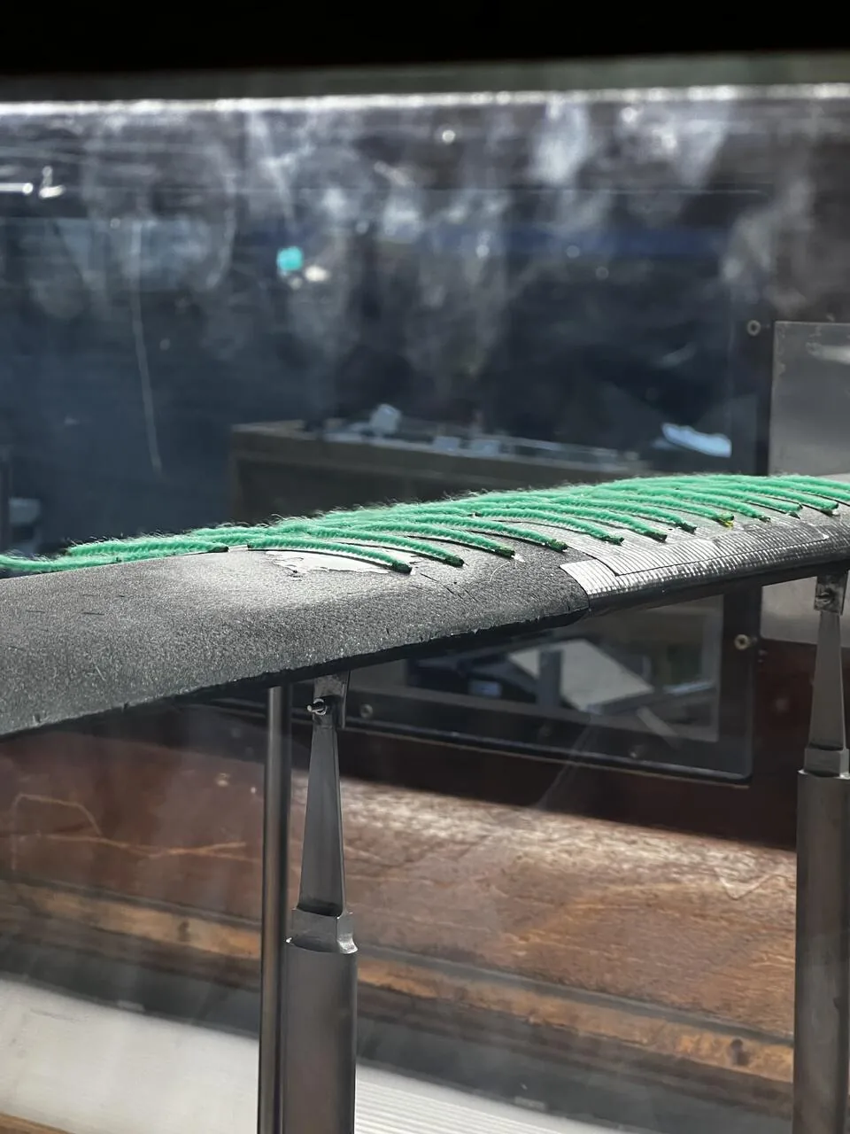 2D NACA 4412 test section in the tunnel, leading-edge view, showing laminar flow.